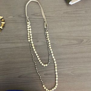 Noonday necklace with silver and ivory beads. necklace extender.